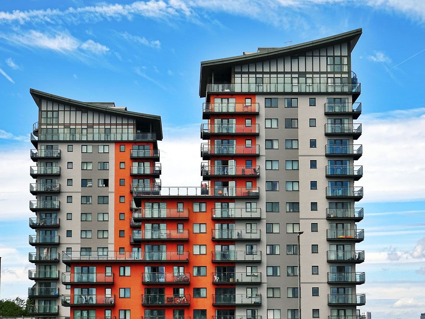 Modern high-rise apartment towers against a clear sky